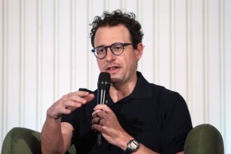 AI stocks slide after Anthropic, OpenAI CEOs urge slowdown