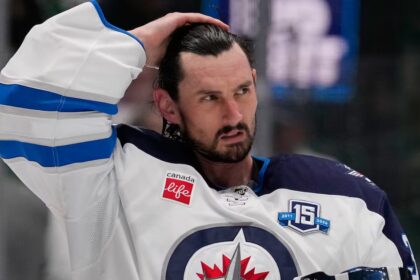 Winnipeg Jets suspend Connor Hellebuyck for failing to report to training camp