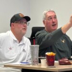 Akron ‘Offensive Coordinator of Game’ meets with Zips coach. Game day next