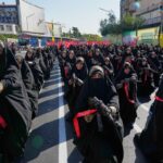 Iranians rally by the hundreds of thousands in biggest show of defiance since war began